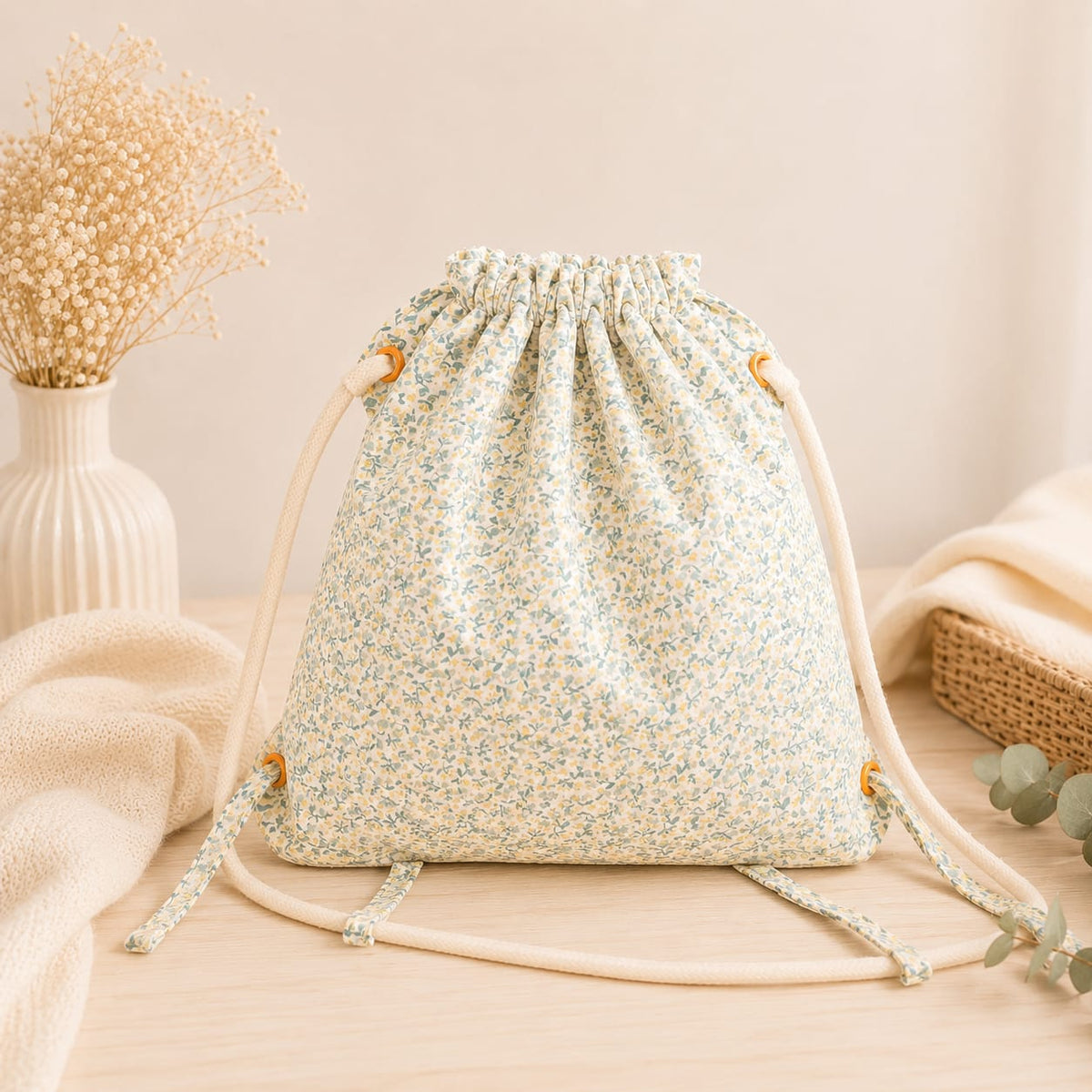 Talega infantil de orejita de conejo floral