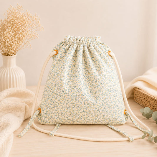 Talega infantil de orejita de conejo floral